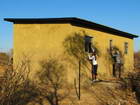 Final cleaning before dedication of Moiponi's house